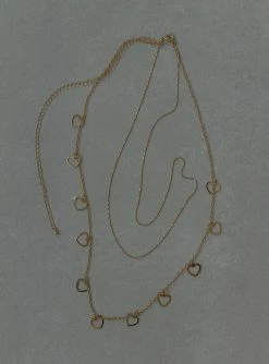 Princess Polly Lower Impact Roca Heart Chain Belt Gold Gold 12 Princess Polly Lower Impact Roca Heart Chain Belt Gold Gold -princess shop 2 47e878d7 f793 4857 a713 01f7e7d12741 1025x.progressive